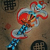snake and dagger with Buddhist prayer on blade