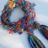 KNITTED SCARVES &
BRAIDED YARN BOAS