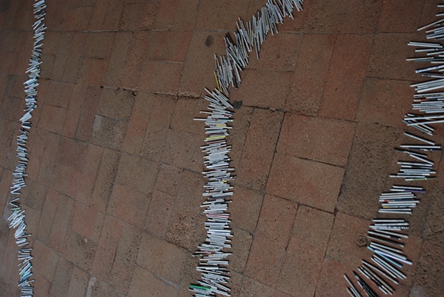 Exhibition Flying Carpet Prayers at El P�sito, rolled newspaper from Catalunya in the shape of Ca�adas Real