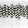 Untitled (Rolled, black and white stripes with strings).
