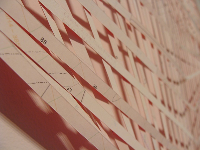 installation made with strips of nautical maps painted with acrylic titled Heave for the exhibition Fathom at the CMCA in May 2011 by Shannon Rankin