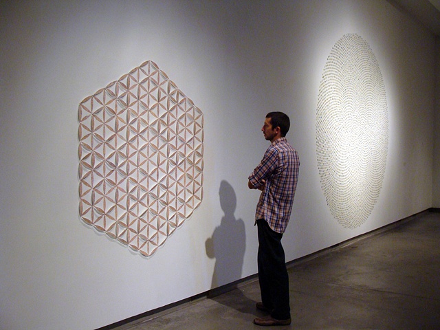 Installation using maps and pins for the 2009 Biennial Juried Exhibition titled Aggregate by Shannon Rankin