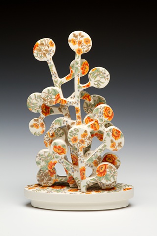 Porcelain tree sculpture with vintage decals 